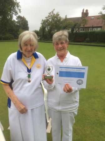Francis Drake Bowls Club, Hilly Fields, Brockley, SE4 1QE. Francis receiving her trophy for most improved female player. 